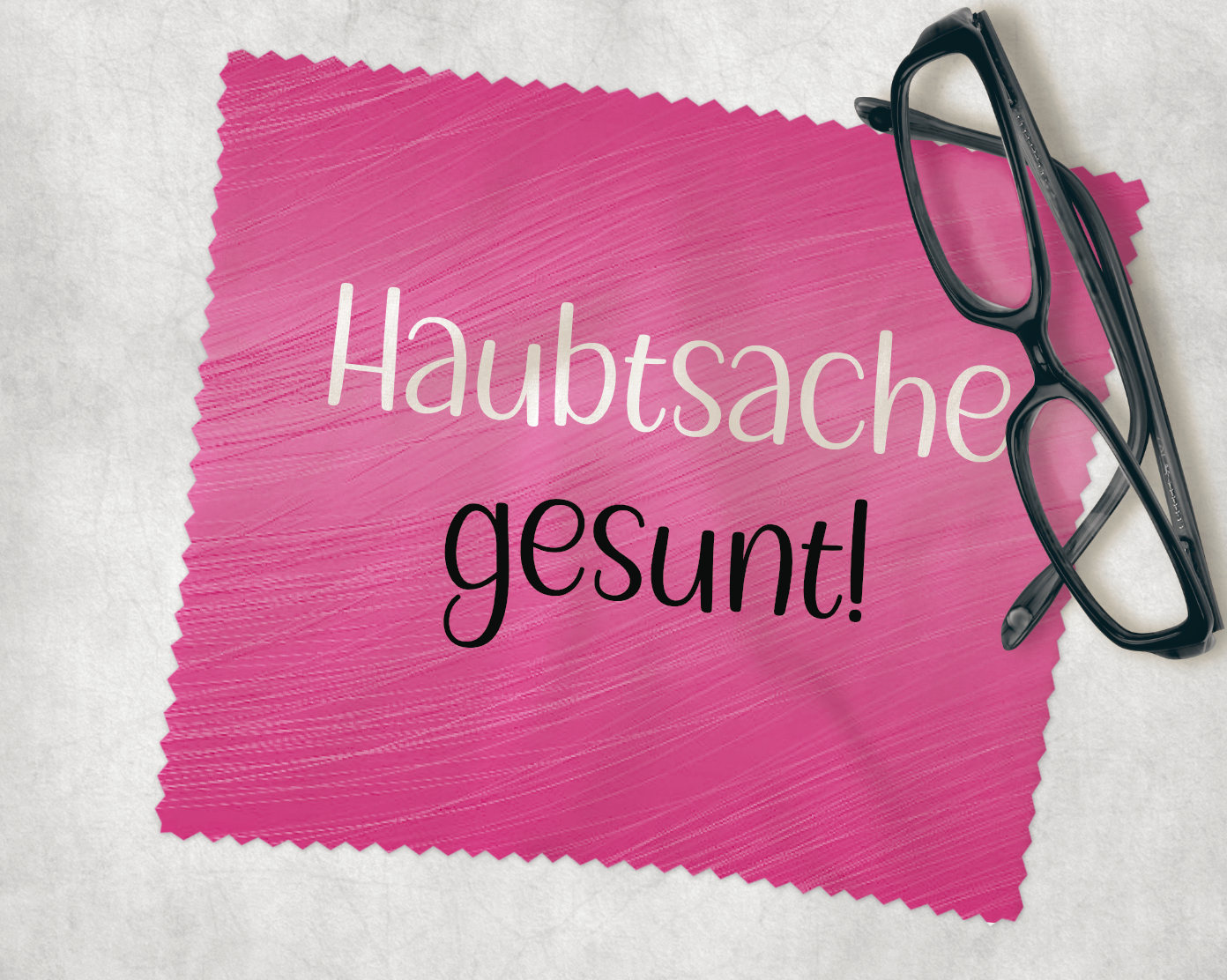 Brillenputztuch in pink mit Aufdruck in schwarz und weiß "Haubtsache gesunt!" Extra falsch geschrieben