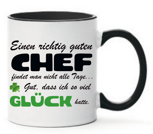 Schwarze Tasse Einen richtig guten Chef findet man nicht alle Tage... Gut, dass ich so viel Glück hatte. Mit Kleeblatt und Glück in grün.